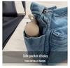 Wszechstronna torba na ramię i crossbody z teksturowanego spranego denimu 2025 z wieloma kieszeniami