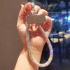 Accesorii pentru telefoane – Curele și brelocuri pentru telefoane