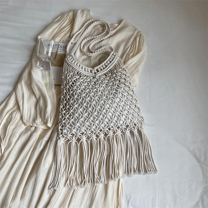 

Сумка ручной работы из хлопковой нити, вязаная, лето 2025, новая, простая, в зарубежном стиле, на плечо, подмышку, плетеная из соломы, ажурная пляжная сумка