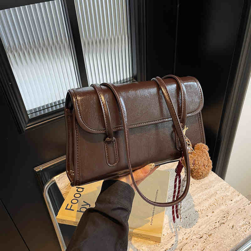 

Новые женские сумки большой вместимости Осень Зима Винтажная универсальная женская сумка через плечо для поездок на работу Текстурированный клапан Квадратный рюкзак