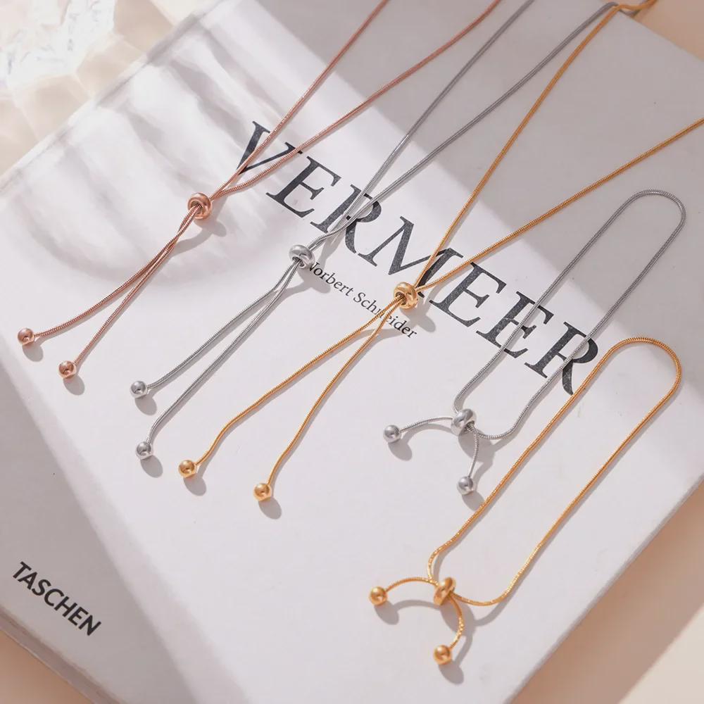 Stylish Non-Fade Round Bead Pull-Out Buckle Women’s 18K Gold-Plated Titanium Steel Jewelry Set: Tassel Necklace, Bracelet, Anklet.
