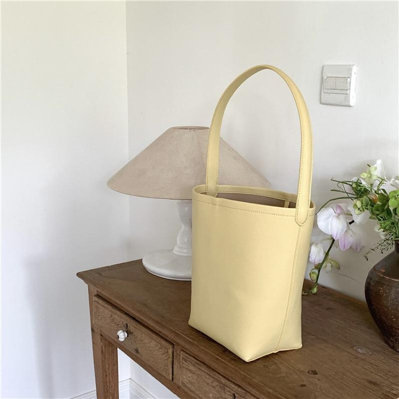 Bucket bag logo shoulder bag large capacity high sense solid color simple leather cylinder mother and child bag