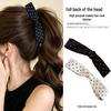 Elegant Black & White Polka Dot Bow Banana Clip: Fashionable Hair Accessory for Women.