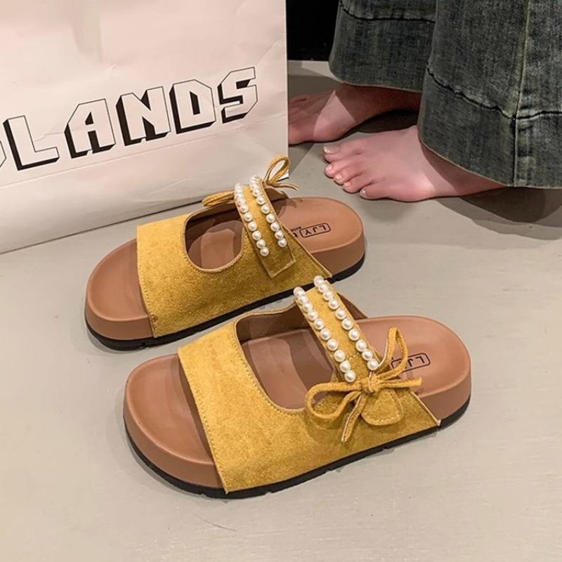 Retro thick-soled one-character pearl sandals summer new bow-tied cool slippers college style hollow slippers