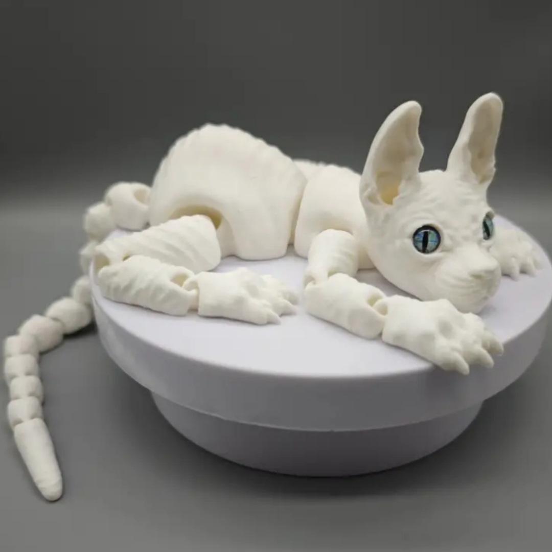 

3D-печатная подвижная игрушка в виде лысого кота со случайными глазами - образовательная и декоративная