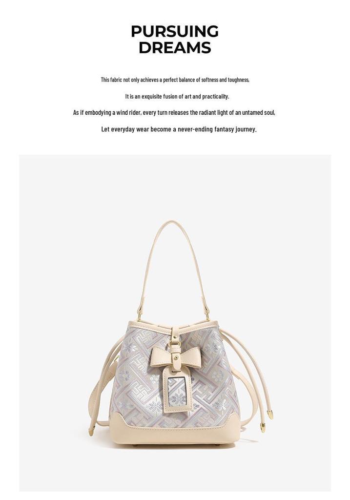 Guangxi Zhuang Brocade Heritage Women's Bow Drawstring Bag - 2026 New Chinese Style Crossbody Bucket Bag