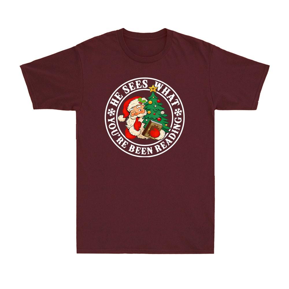 He Sees What Youve Been Reading Bookish Christmas Santa Clause Unisexs TShirt