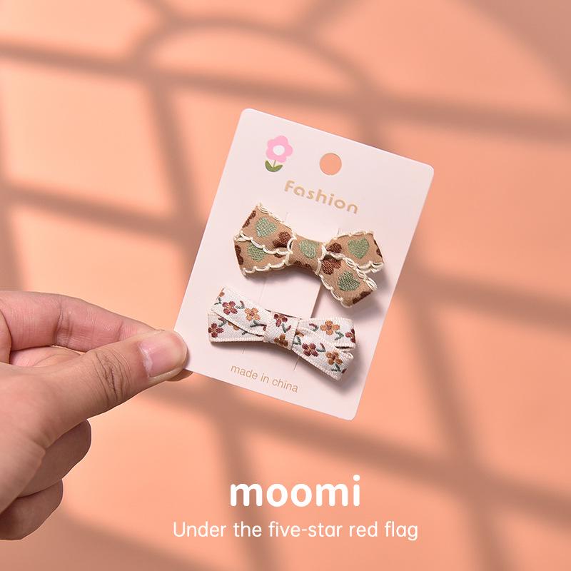

Handmade Retro Floral Bow Hair Clip for Baby & Children - Gentle on Hair
