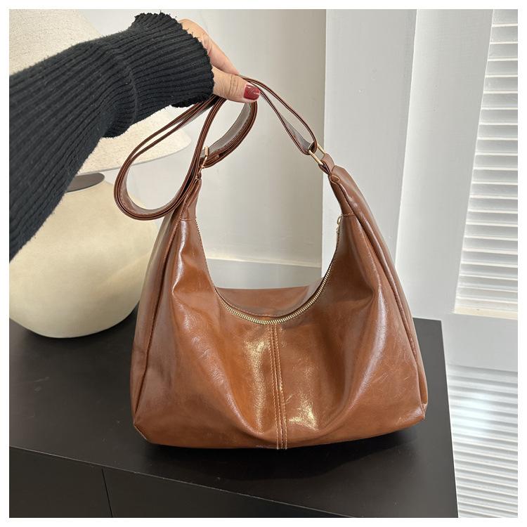 

Однотонная ретро большая вместимость 2025 новый тренд модная простая повседневная наплечная сумка-тоут женская