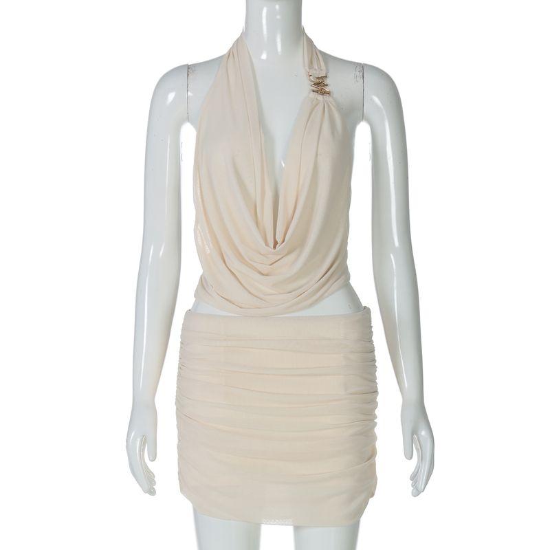 

Shemoda Vacation Style Sexy Backless Mesh Patchwork Swing Collar Camisole + Pleated High Waist Skirt Suit Apricot color S