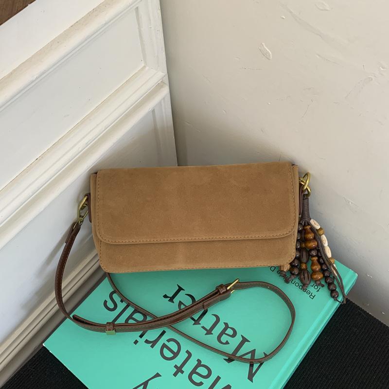 Простая и модная однотонная сумка, женская сумка-багет, осенняя новая модная нишевая высококачественная сумка на одно плечо под мышку