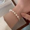 Elegant Women’s Pearl Bracelet: Half-Bangle, Half-Chain Design