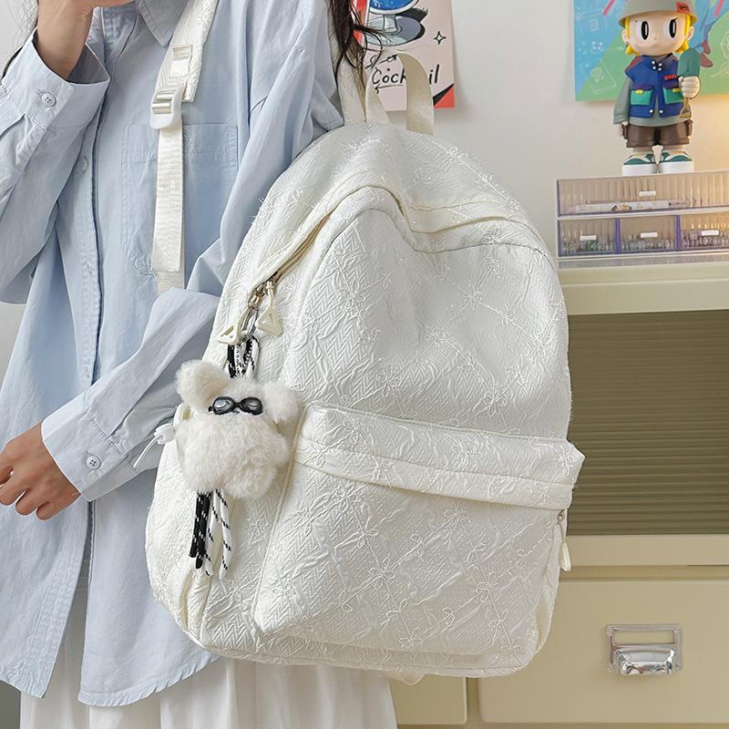2025 new high-value travel lightweight junior high school student backpack women's large-capacity literary and versatile schoolbag