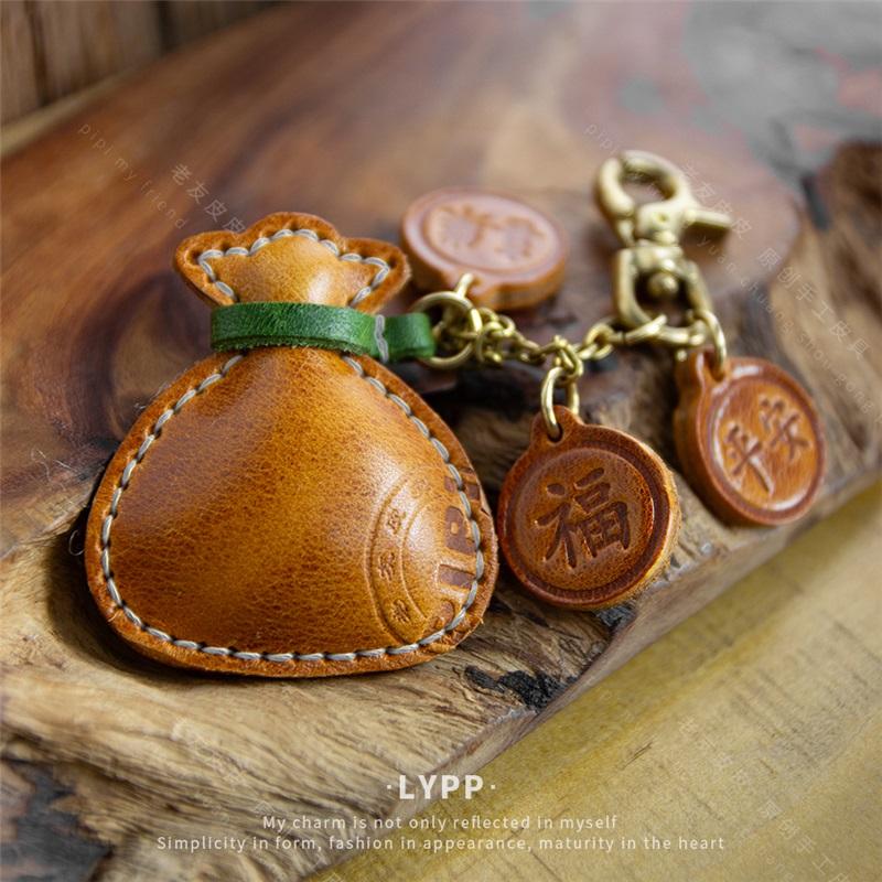 

Handmade genuine leather bag keychain in a gourd shape, new vintage model for car жёлтый