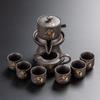Purple sand tea set   new lazy tea brewer automatically rotates the water outlet Kung Fu tea cup gift box as a gift.