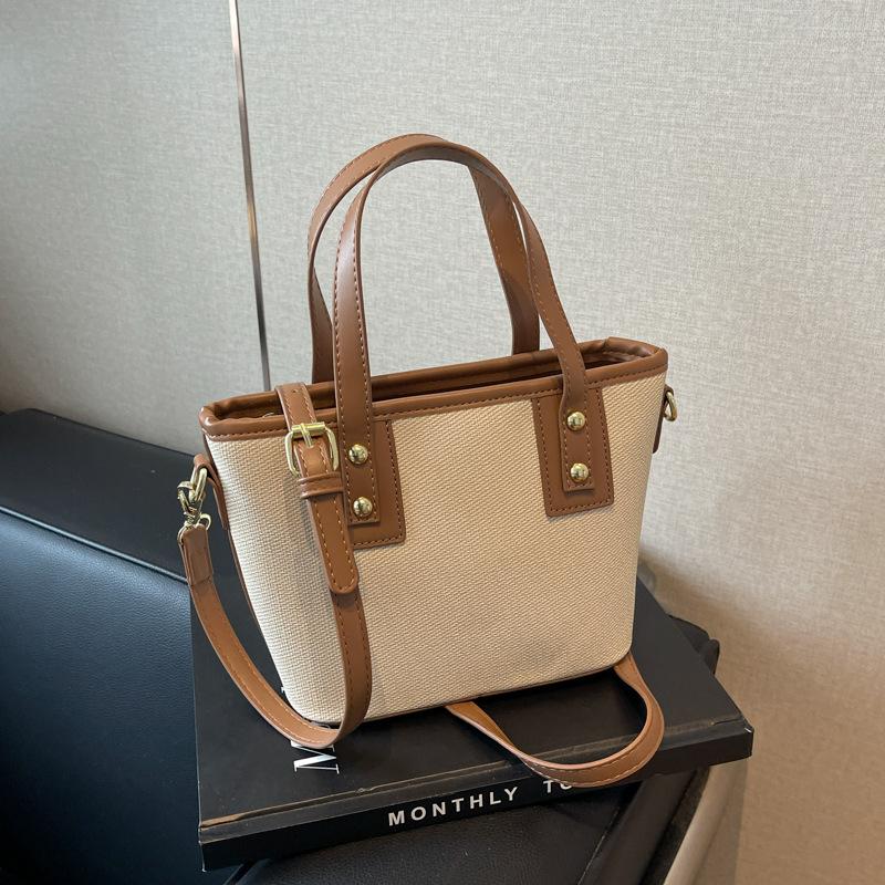 Autumn new fashionable and simple contrasting color vegetable basket bag portable shoulder oblique span trendy women's bag