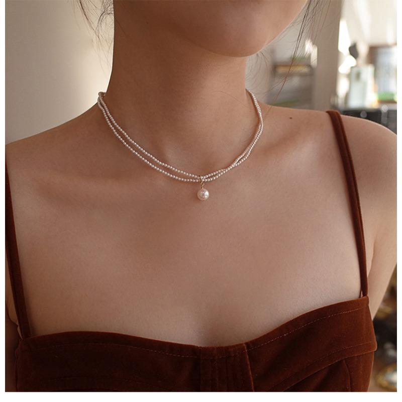 Женское двуслойное жемчужное колье-капля на ключицы