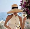 Cappello estivo di paglia stile Hepburn cappello a tesa larga elegante francese da donna cappello da sole per viaggi al mare sombrero
