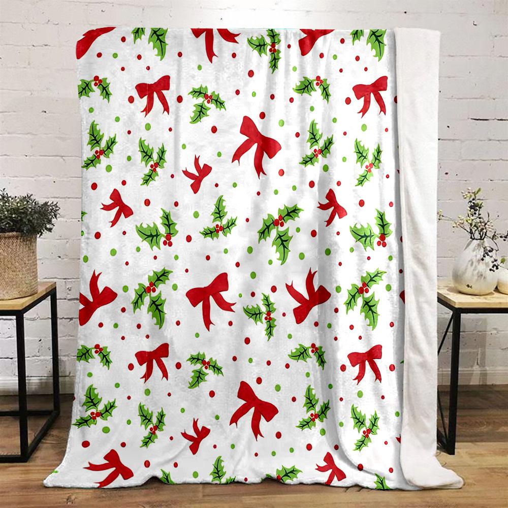 Christmas Holly and Red Ribbon Pattern Patterned flannel blanket perfect for the bedroom living room, sofa, or a little nap