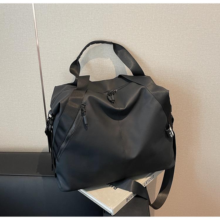 Large capacity travel bag women's new casual shoulder messenger bag versatile sports commuter tote bag