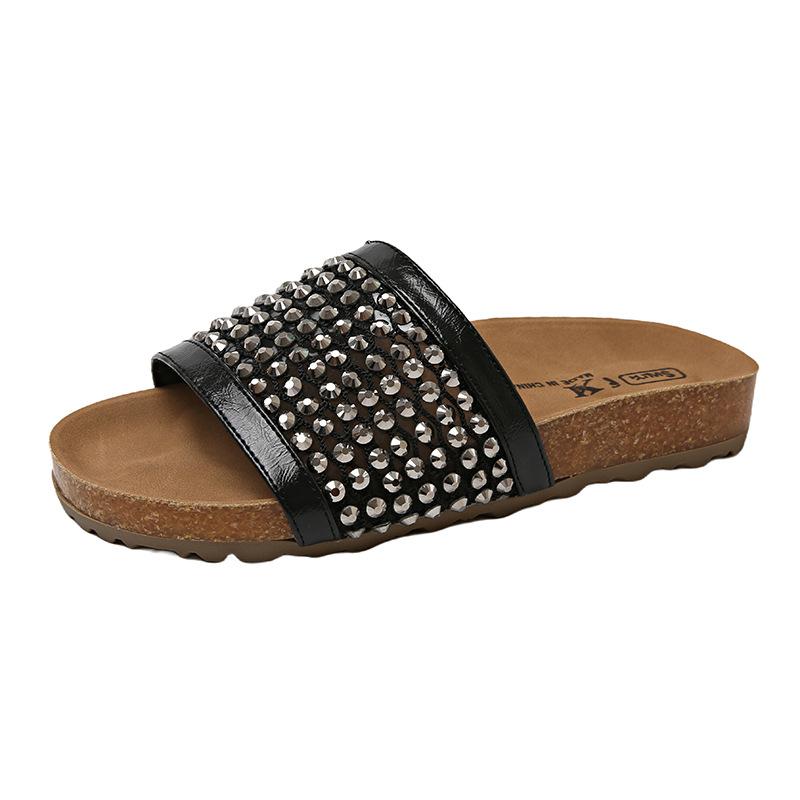 

Fairy wind open-toed flat-bottomed one-word cool slippers female 2025 summer Korean version of the new rhinestone hollow beach slippers female 35 чёрный