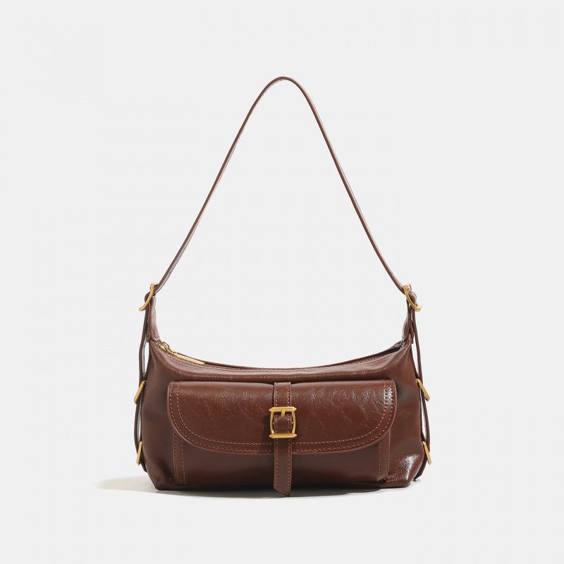 

Niche handbag women s 2025 autumn and winter lock Korean version of the new simple commuter shoulder underarm messenger bag women s bag светло-коричневого