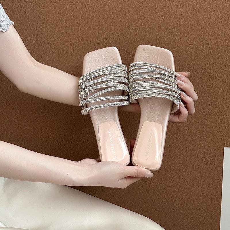 Premium flat-bottomed one-word drag shoes summer French beautiful outer wear with skirt casual beach women's wedge heel sandals
