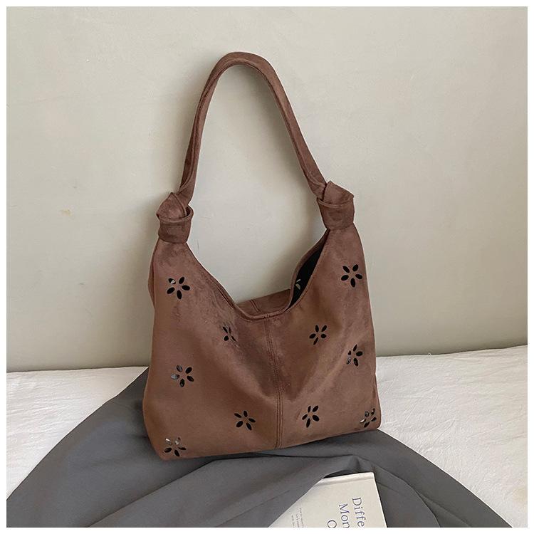 Tasche im College-Stil Damen lässige hohle Tragetasche ausländischer Stil Wildleder Umhängetasche Damen Pendler Achseltasche