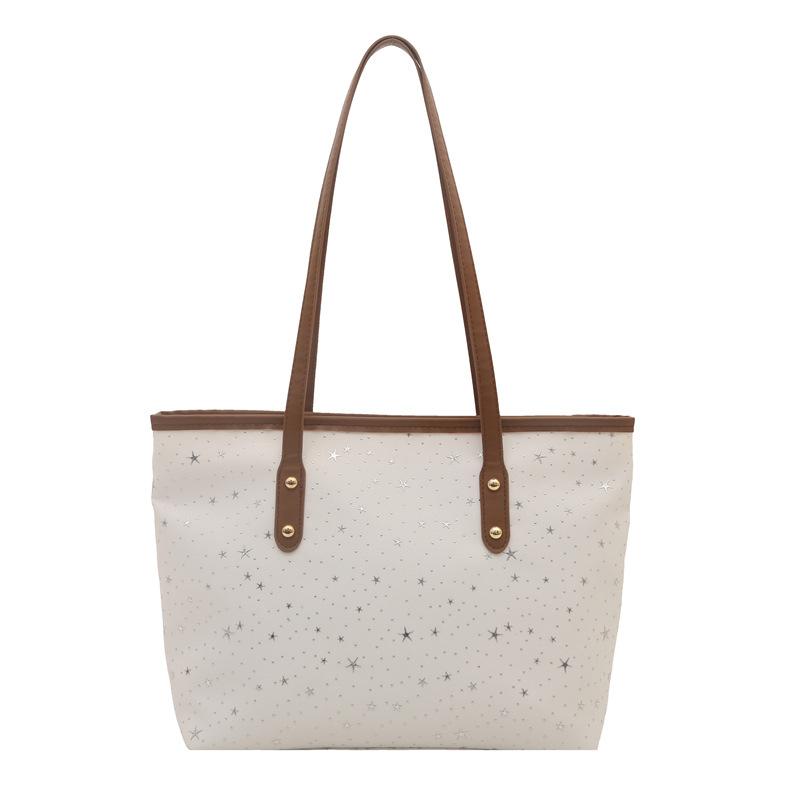 Personnalité étoile style étranger printemps nouveau grande capacité tendance style doux portable fourre-tout épaule aisselle sac pour femmes