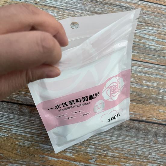 100 ks plastové fólie na jedno použití zabraňující ztrátě vlhkosti PE materiál Víceúčelová samolepka masky s dokonalým střihem pro lázně