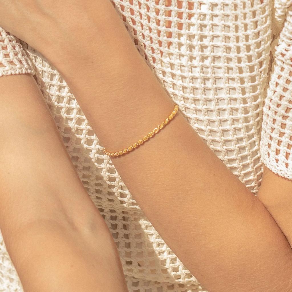 Popular simple twist chain bracelet, copper-plated 14K gold hip-hop niche design jewelry wholesale