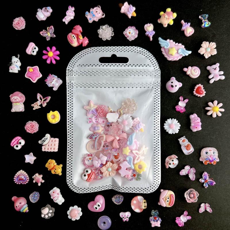 30 kusů růžových kreslených ozdob na nehty: Roztomilá žába, Mašle, Srdce, Květina, Poupě, Medvědí doplňky