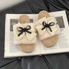 Flat-bottomed cute fluffy slippers women's warm and comfortable autumn retro bow non-slip cartoon one-pedal cotton slippers