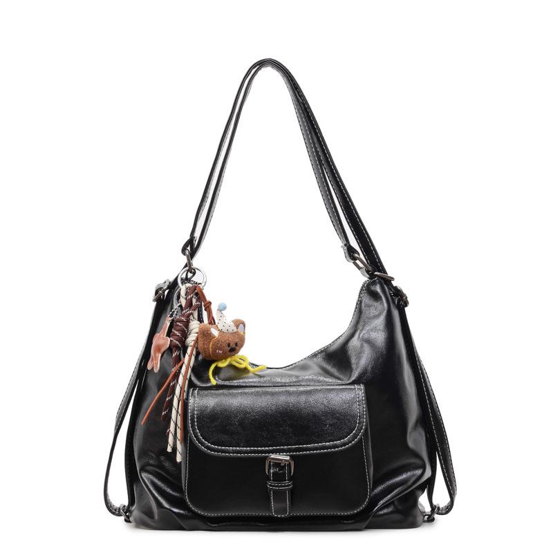 Casual large capacity retro bag women 2025 new versatile shoulder bag double shoulder backpack commuter bucket bag