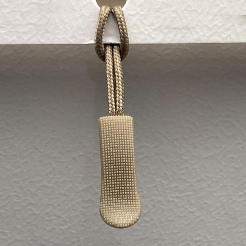 Available: Black Detachable Zipper Pull Lanyard with Silicone Rope.