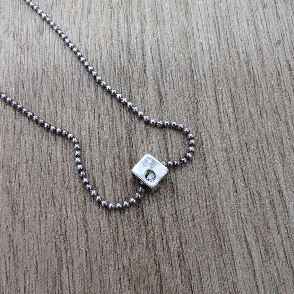Used moschino silver necklace square dice