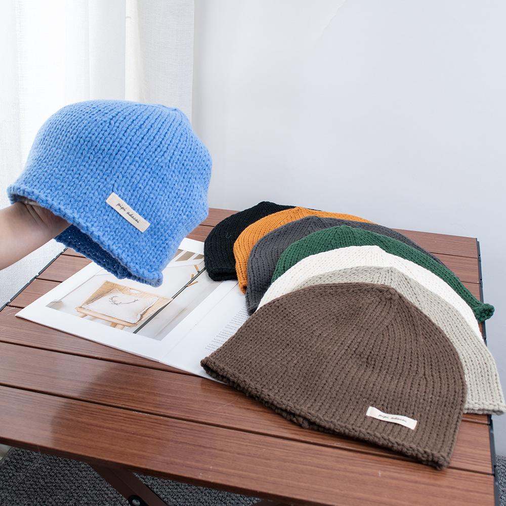 Simple solid color knitted bag head stacking hat women's early autumn new plain and versatile big head circumference showing face small wool hat