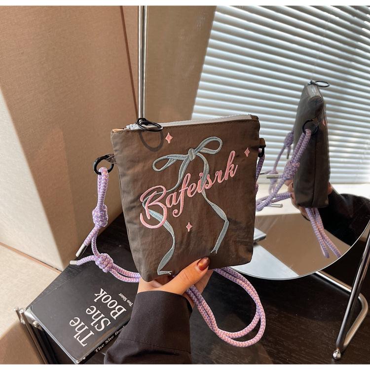 

Canvas bag women s summer 2025 new versatile shoulder messenger bag casual this year s popular bucket bag