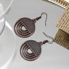 Retro Alloy Jewelry: Round Hollow Pendant Earrings & Ear Cuffs for Women