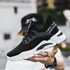 2023 nuevos zapatos de hombre tejidos voladores zapatos de inyección de Color sólido tejido volador tendencia diaria zapatos de hombre de cabeza redonda baja