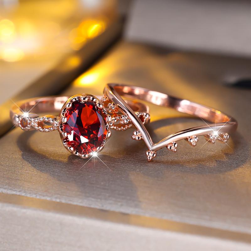 Prachtige roségouden kleurige ovale rode kristal verlovingsringenset voor vrouwen Romantische zirkoonstenen trouwbelofte ringset Sieradencadeaus