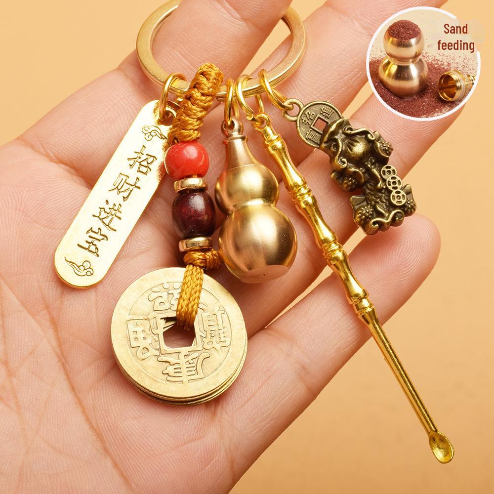 

Брелок-амулет: Монеты пяти императоров, тыква, счеты, башня Вэньчан, денежный мешок, Будда, совок для мусора, ложка для ушей, подвеска с изображением живописного места