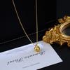 Gold-Plated Round Ball Pendant Necklace: Modern Elegance with Ancient Style