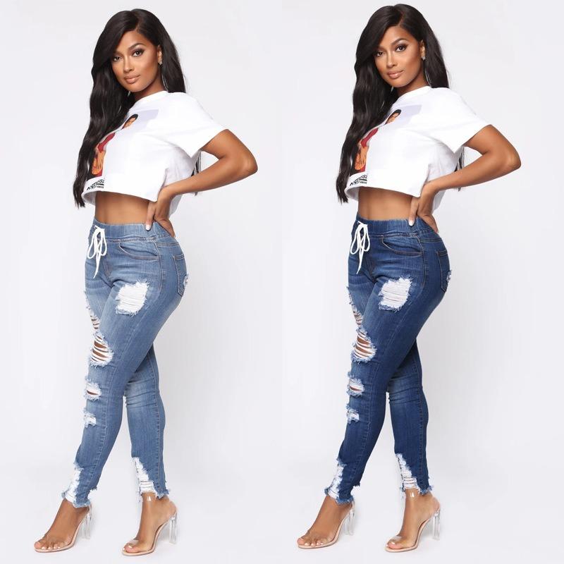 Jeans skinny con elastico in vita, vita media, strappati, allacciati in pizzo per donna