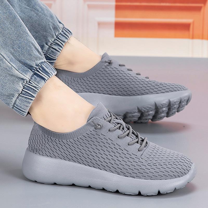 Sommer Paar Socken Schuhe Herren- und Damenschuhe neue fly-gewebte atmungsaktive Sport- und Freizeitschuhe leichte weichsohlige Reiseschuhe