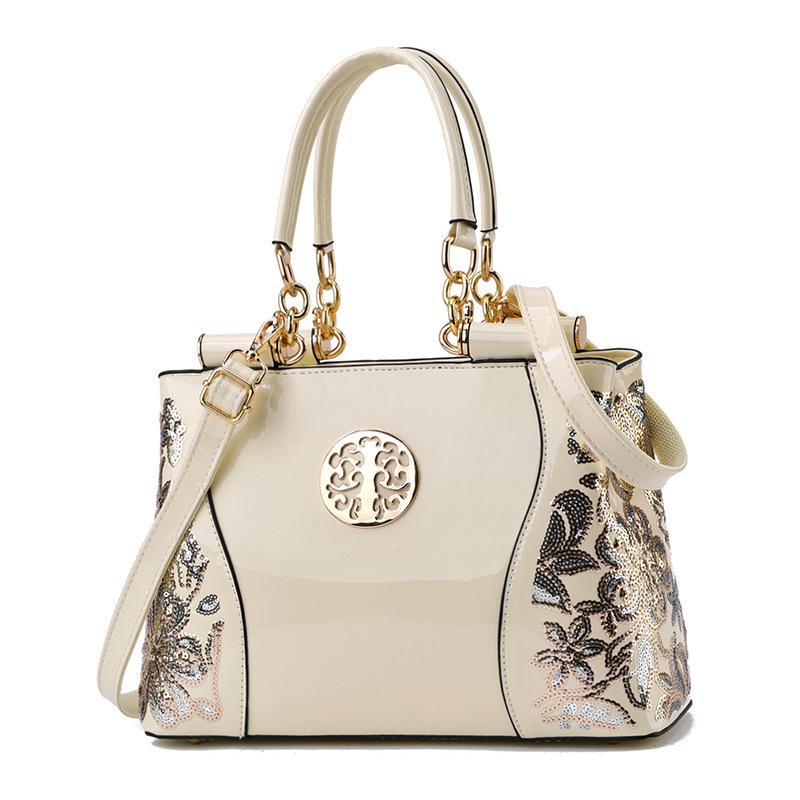 Autumn European and American retro handbags large-capacity bright leather double-sided embroidered women s bags atmospheric shoulder messenger bags