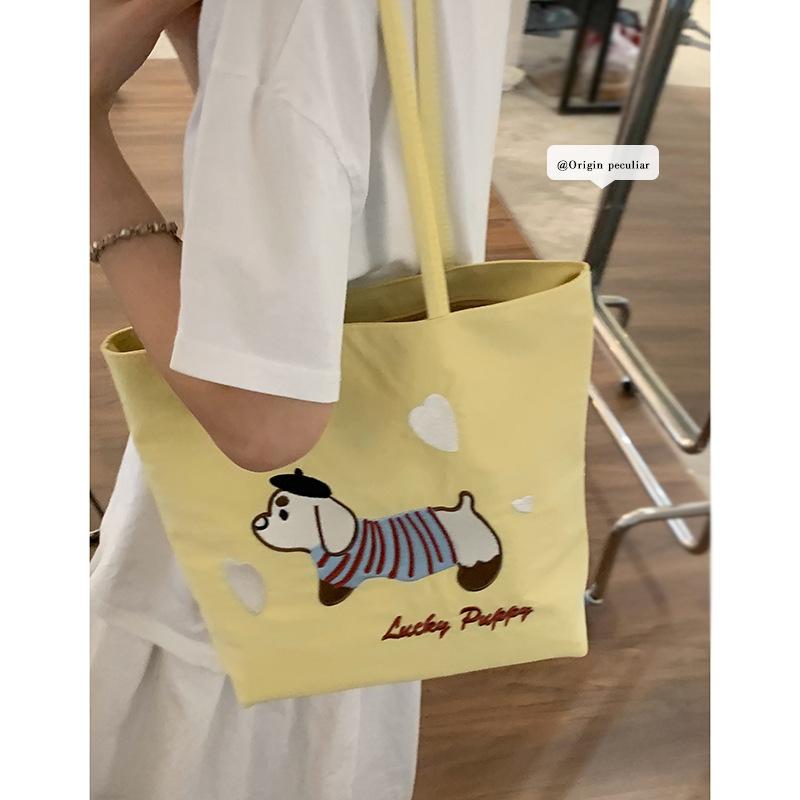 Canvas Bag Design Sense Niche Underarm Bag Women 2025 New Simple Cartoon Puppy Tote Bag Shoulder Bag Portable