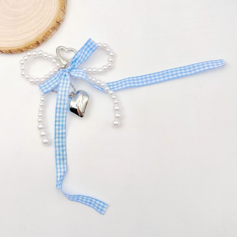 Women Fashionable Bow Keychain Shaped Pearl Mobile Phone Charm, Bag Charm And Accessory.