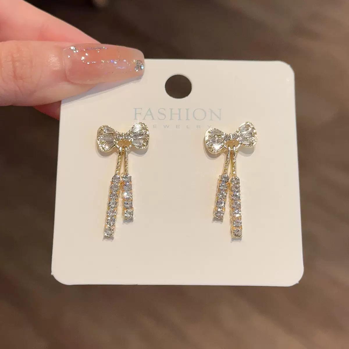 

Temperament Bowknot Dangle Stud Earrings For Women Chic Gold Color Shiny Rhinestone Long Earrings Trendy Jewelry