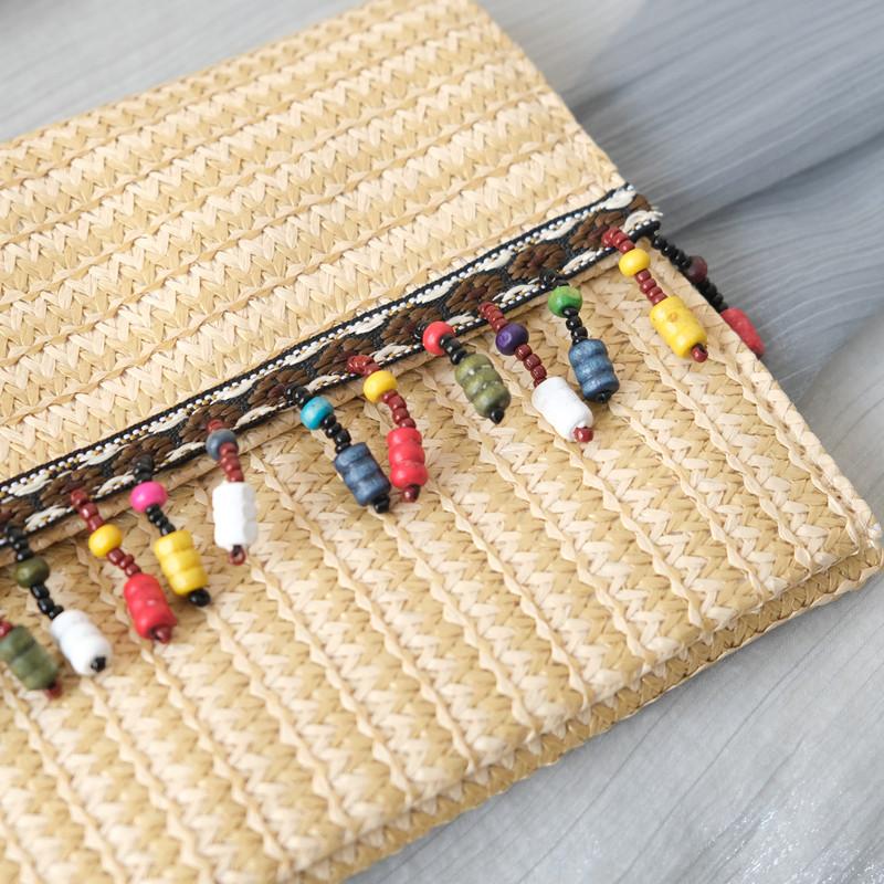 Neue Frühling Sommer Trendy Handtasche Mode Frauen Tasche Solide Stroh Casual Kupplung Frau Niedlich Quaste Vintage Strand Kleine Reise Handtasche